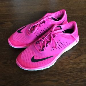 Pink Nike tennis shoes